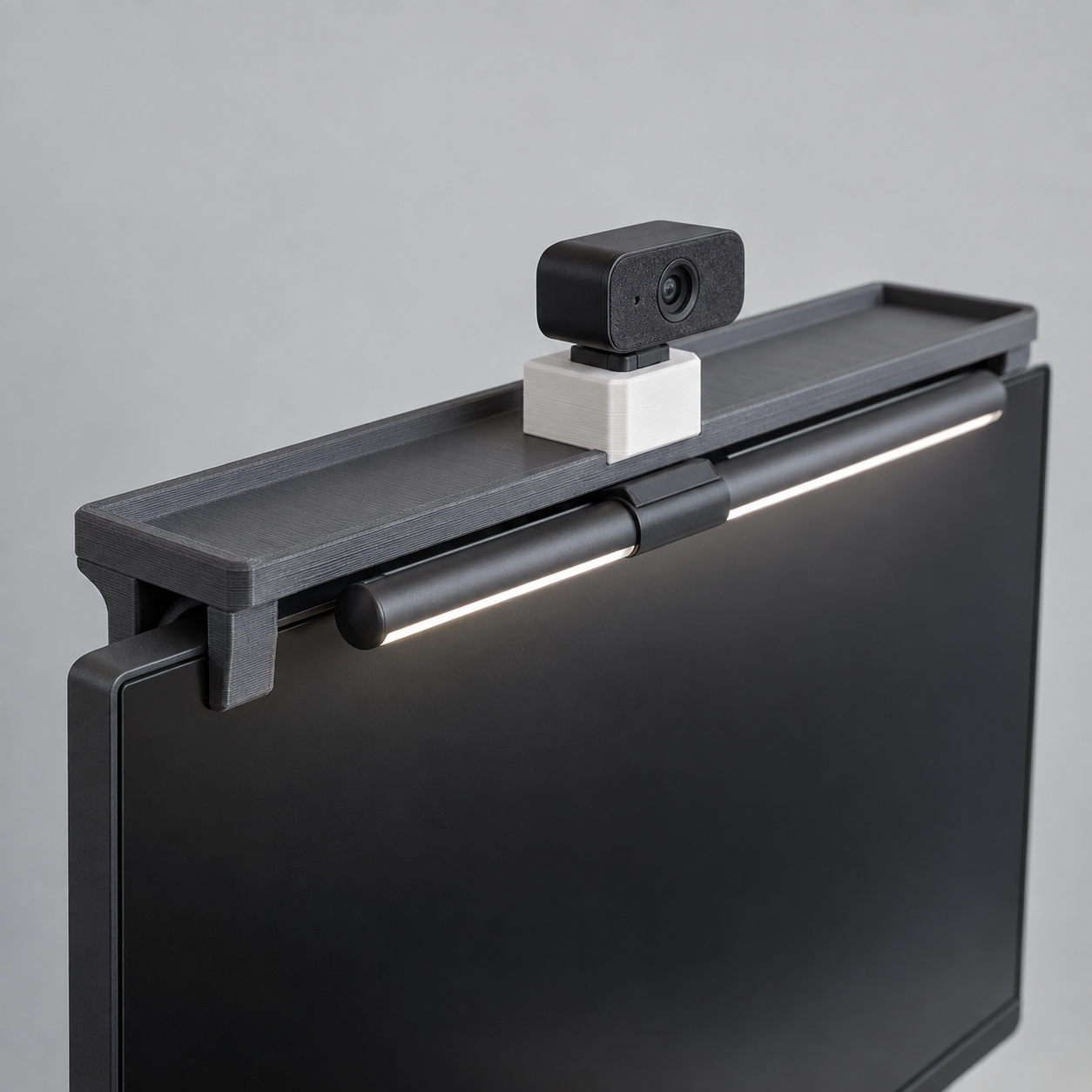 Halo Riser — Monitor-Top Webcam & Light-Bar Shelf with Slide Shutter